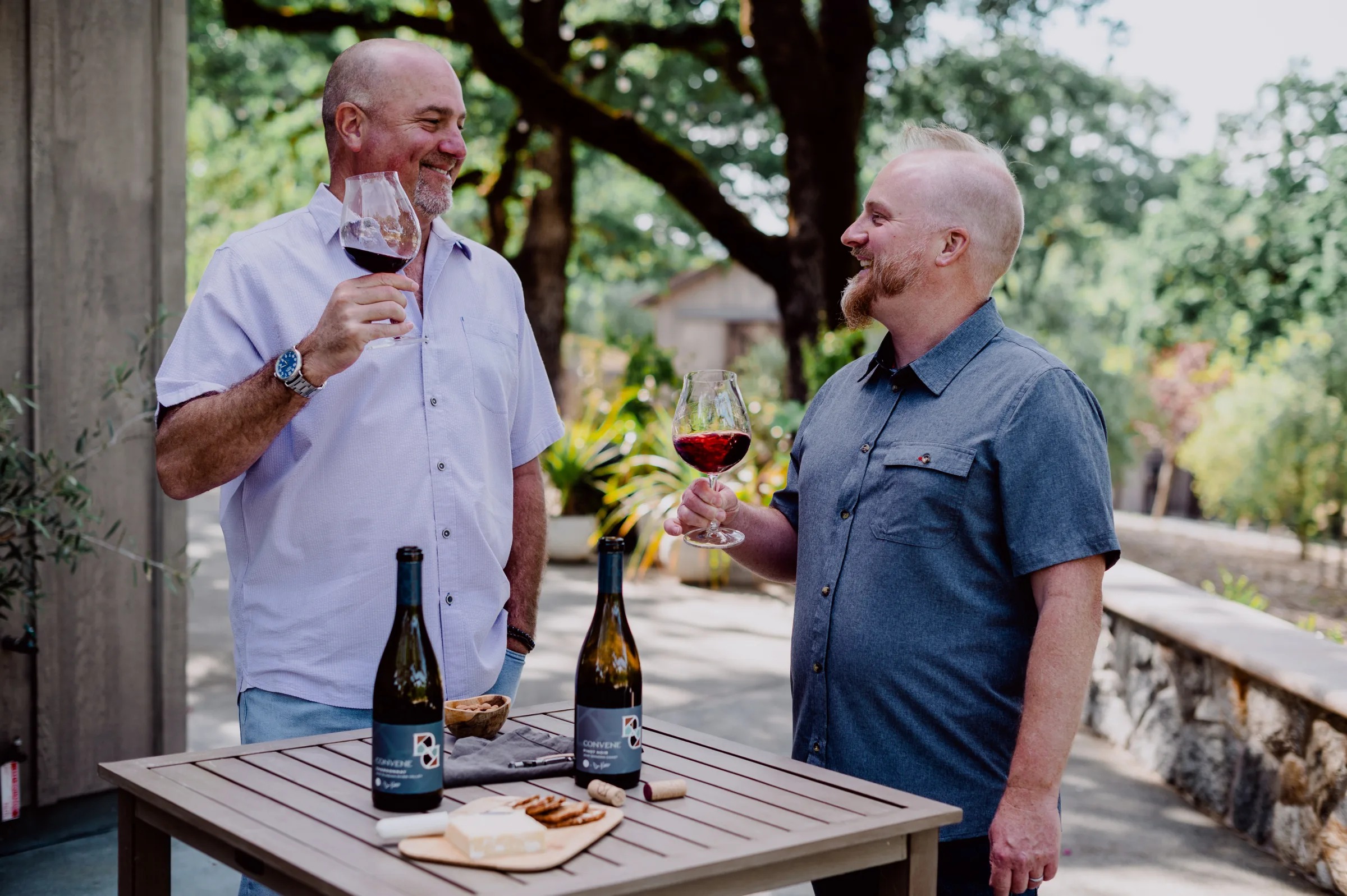 Dan Kosta and winemaker Shane Finley enjoy wine at Convene Winery, Santa Lucia Highlands.