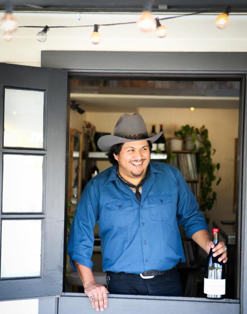 Vince at I Brand Winery tasting room in Carmel Valley welcoming guests to try winemaker Ian Brand's Monterey County wines.