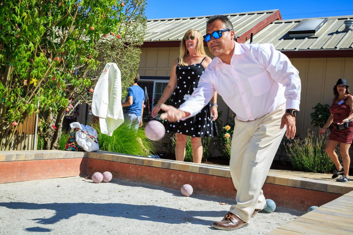 Guests playing bocce ball at Scheid Family Wines in Greenfield, California