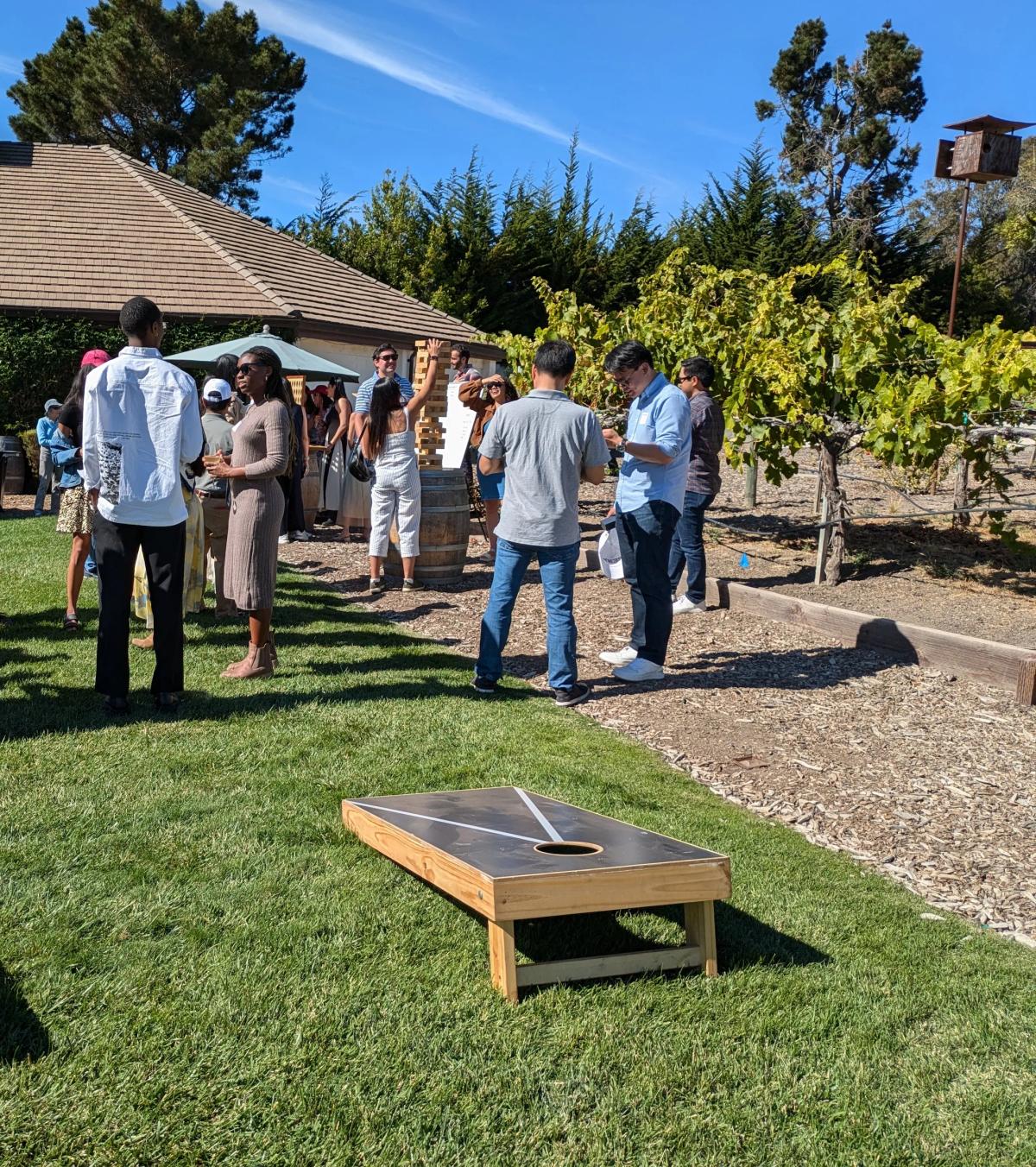 Cornhole and Jenga games entertain winery guests including families at Folktale Winery and Vineyards in Carmel Valley, California.