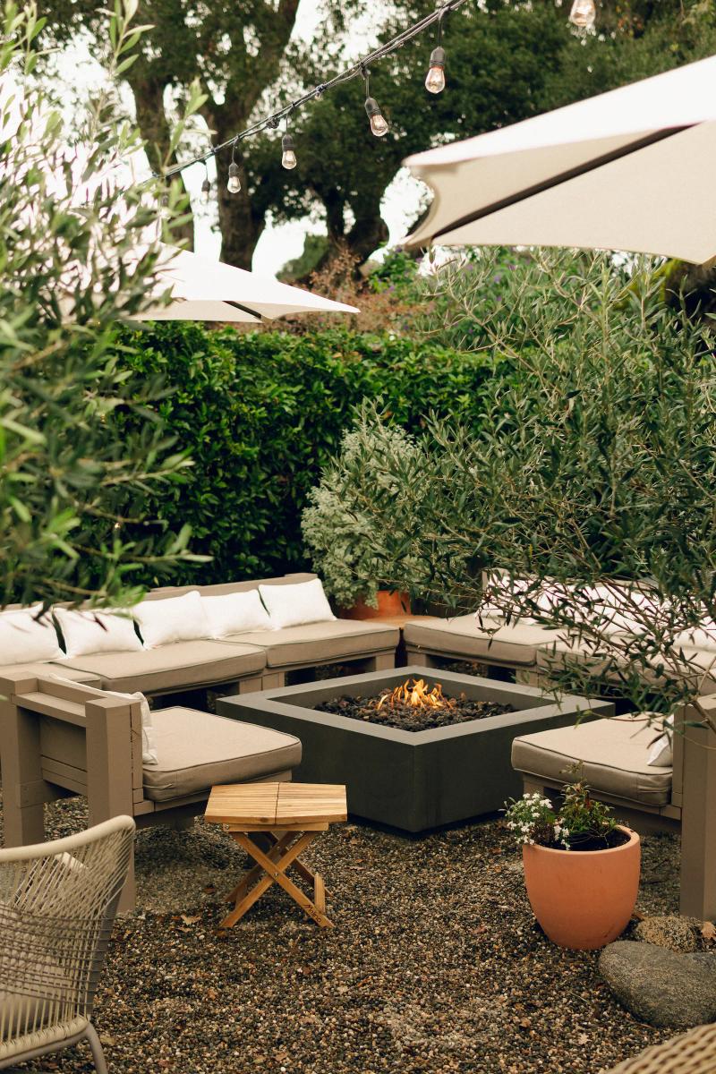 Corral Wine Company in Carmel Valley has an inviting patio with lounge space, fire pits and even a play area for kids at their tasting room.