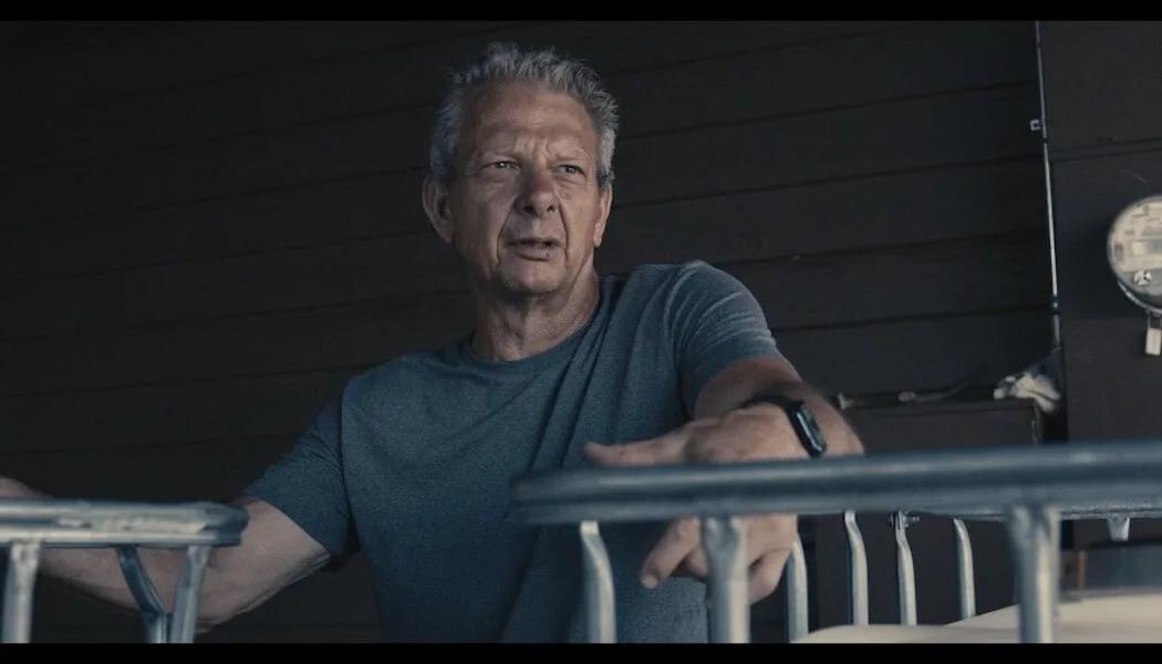 Chris Jones, a man with graying hair, looks thoughtfully to the side.